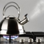 Stainless steel kettle on stove