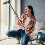 Girl with a vacuum cleaner