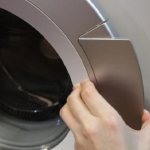 How to open a washing machine yourself if the handle is broken