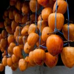 How are persimmons dried and dried?