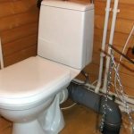 Option for connecting a sewer system to a toilet in a private house